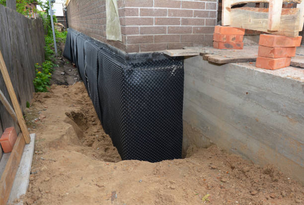 SJ Waterproofing Pros technician performing targeted Vapor Barrier Installation assessment in Darby, PA